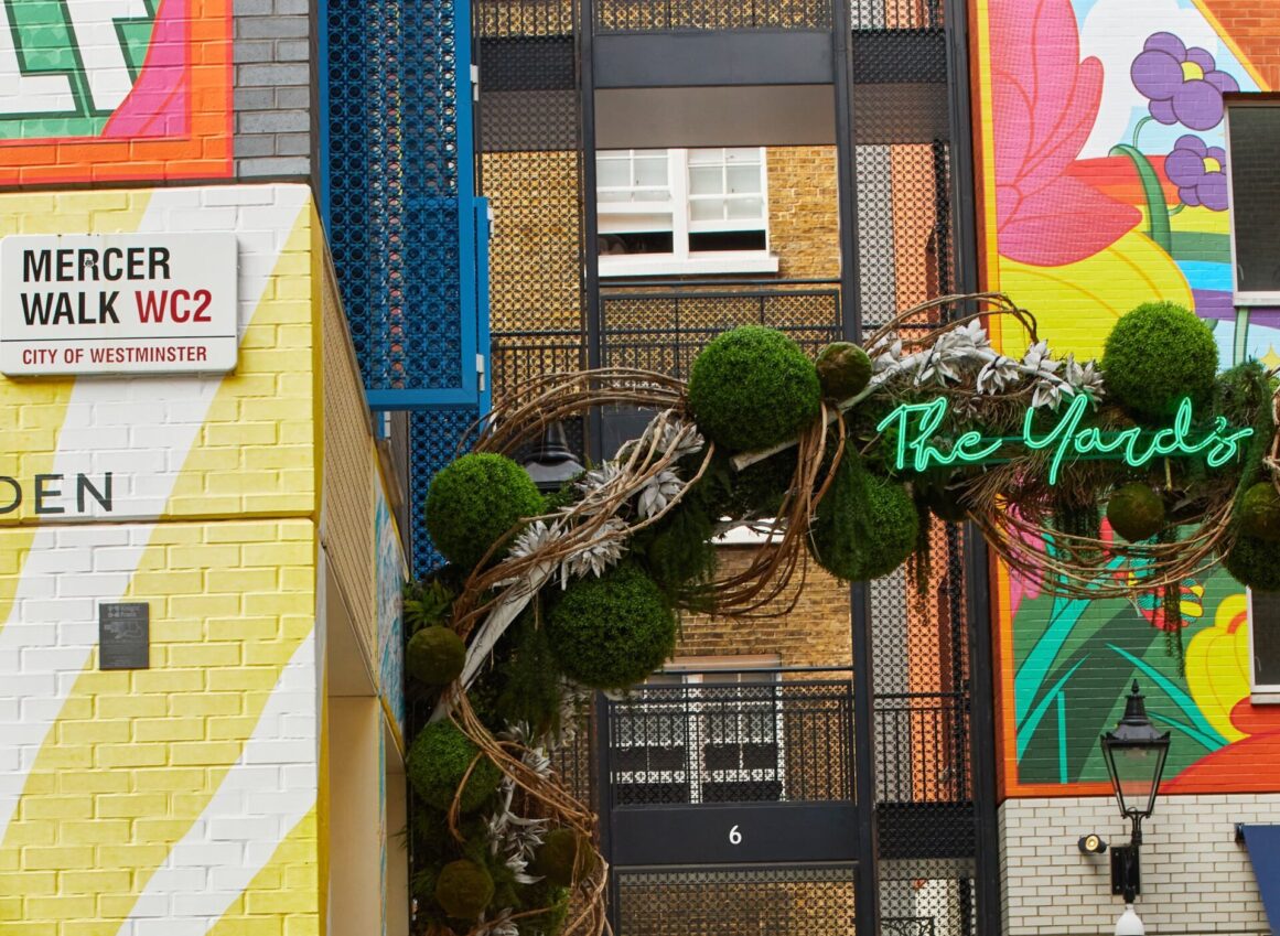 Mercer Walk artwork and floral archway